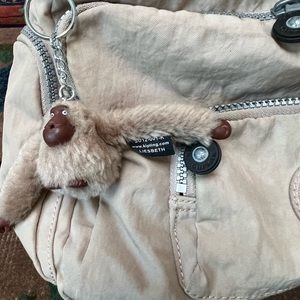 Kipling Messenger Bag w Liesbeth monkey. Lt. Tan rip stop fabric. Spotless